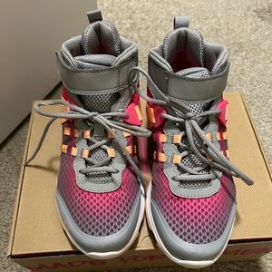Ryka Mid-top athletic sneakers, size 7 excellent condition with the box.